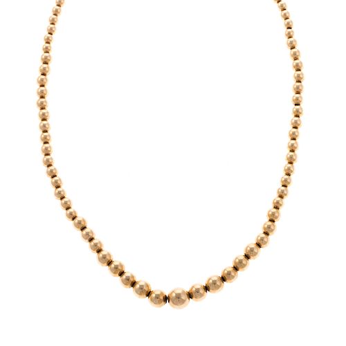 A Ladies 14K Yellow Gold Graduated Beaded Necklace
