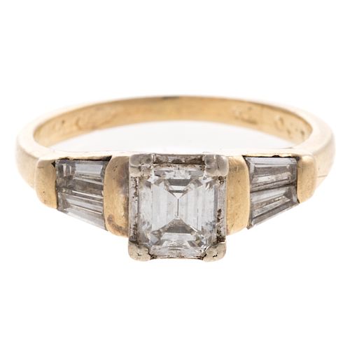 A Ladies Emerald Cut Diamond Engagement Ring