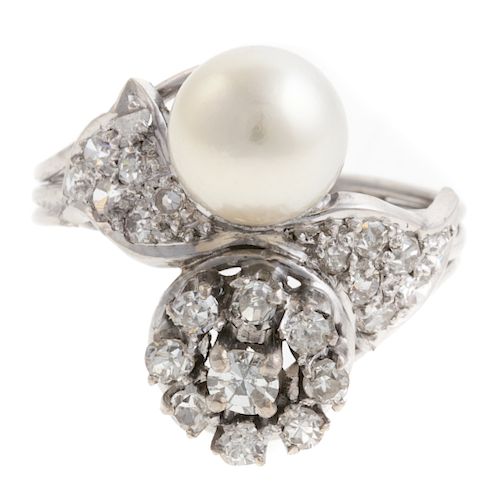 A Ladies Vintage Diamond & Pearl Ring in Platinum
