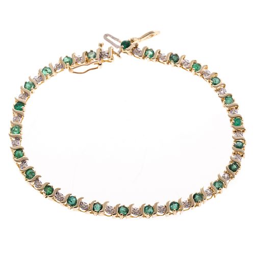 A Emerald and Diamond "S" Link Bracelet in 14K