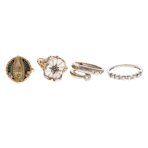 A Collection of Rings in Gold with Diamonds