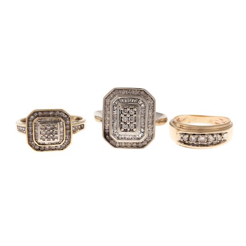 A Trio of Diamond Ring and Bands in Gold