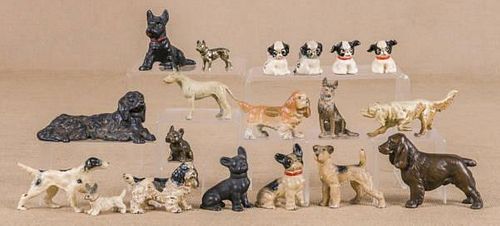 Nineteen cast iron, spelter, and metal dogs, larg