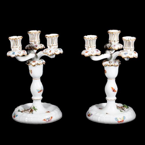 A pair of Herend porcelain candelabras.