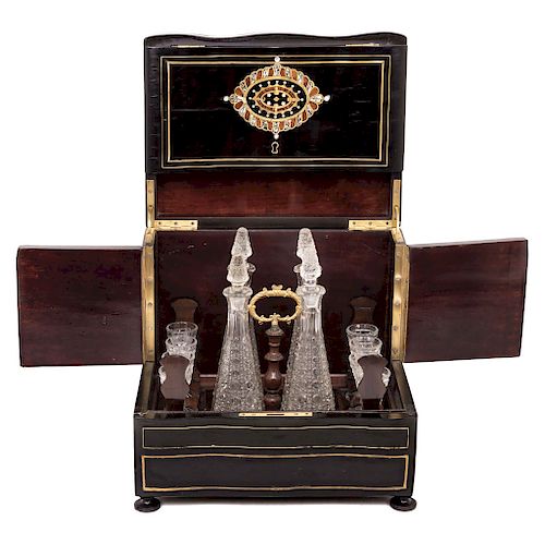 DECANTER BOX. FRANCE, 19TH CENTURY. Napoleon III Style. Ebonized wood with mother-of-pearl and brass details.