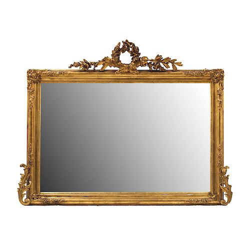 MIRROR. BEGINNING OF THE 20TH CENTURY. French style. Golden wood. Rectangular design with beveled moon. 