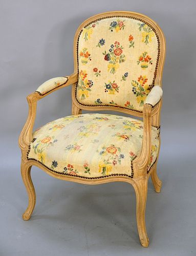 Louis XV upholstered beechwood fauteuil, 18th/19th century, chenille fabric woven with colorful foliage sprays, ht. 36 in., wd. 25 i...