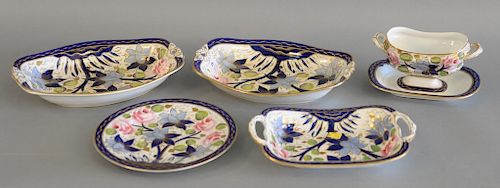 Nineteen piece porcelain dessert set, 19th century, iron red pattern NO. 1813, painted with roses and blue flowers to include two lo...