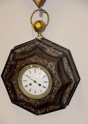 Regency black, gilt and white painted tole wall clock, of octagonal-form and enamel dial. circa 1820, ht. 19 in., dia. 14 in.