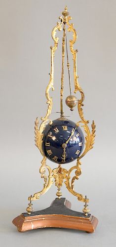Continental ormolu and blue globular table clock on foliate cast open supports with spherical movement housing. ht. 17 in.