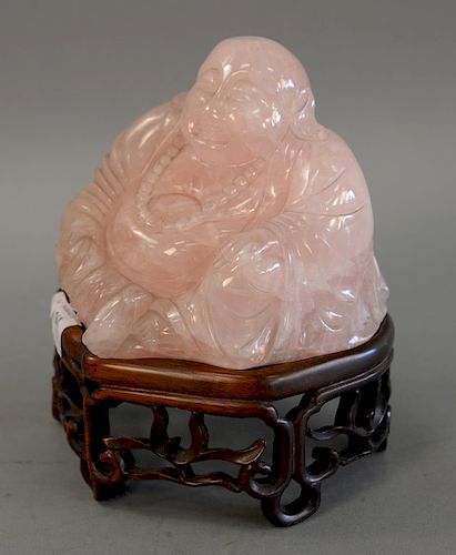 Rose quartz figure of a seated Buddha on carved stand. figure ht. 5 3/8 in.