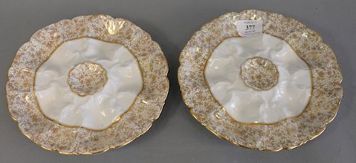 Set of twelve French gilt decorated oyster plates, marked red script RB. dia. 8 1/2 in.