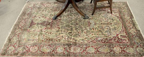 Kashan silk Oriental rug, three dimensional with birds, animals and serpents, signed, 20th century. 4'5" x 7'.