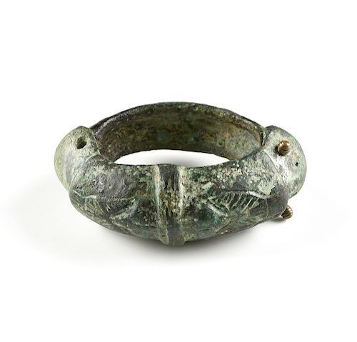 AN ANCIENT NEAR EAST STYLE BRONZE OWL BRACELET, ATTRIBUTED TO LURISTAN, POSSIBLY 8TH-4TH CENTURY BC,