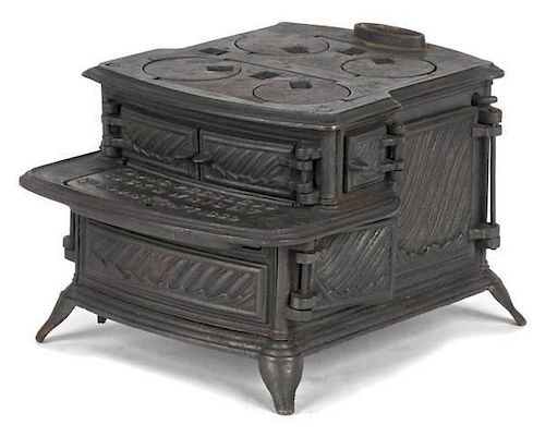 Cast iron Young Peerless toy stove, inscribed