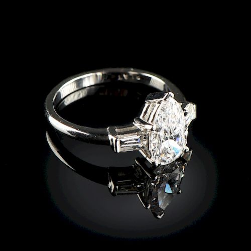 A PLATINUM AND PEAR-SHAPED DIAMOND LADY'S RING,