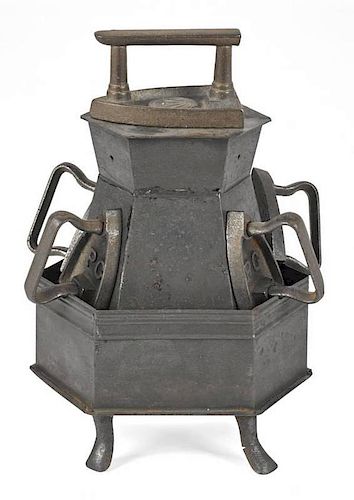 Tin sad iron heater, together with five cast iron