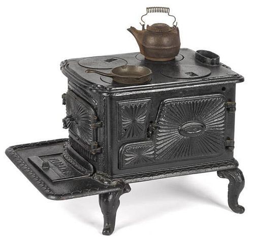 Cast iron Florence toy stove, 9 1/4'' h., 10 1/4