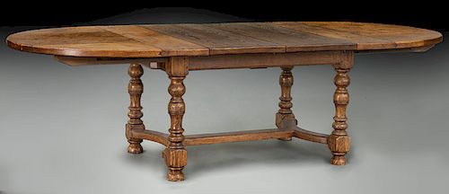 Antique style oak dining table with two leaves