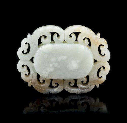 A Chinese Pale Celadon and Russet Jade Pendant 
Length 2 in., 5 cm.