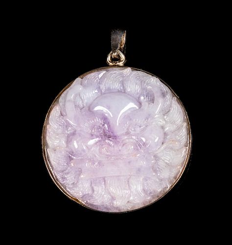 A Chinese Lavender and Pale Celadon Jadeite Circular Pendant 
Diam 2 1/4 in., 6 cm. 