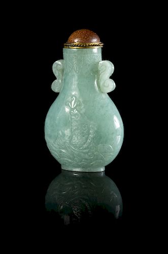 A Chinese Celadon Jadeite Snuff Bottle
Height 2 1/2 in., 6 cm. 