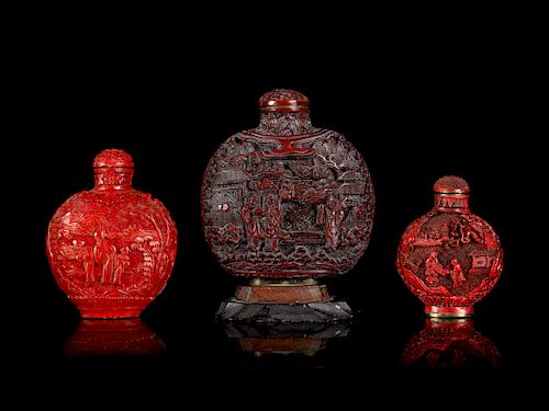 Three Chinese Cinnabar Lacquer Snuff Bottles
Largest: height 3 1/8 in., 8 cm. 