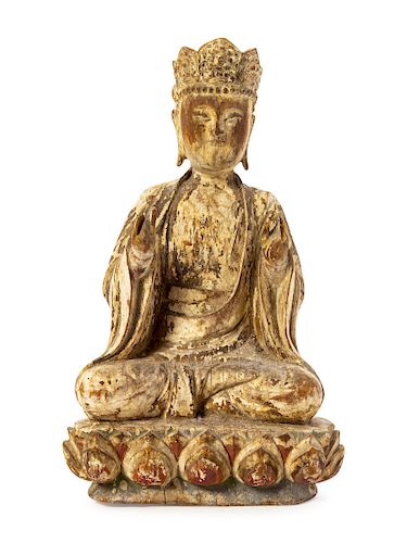 A Chinese Carved Wood Figure of Guanyin
Height 12 1/4 in., 31 cm. 
