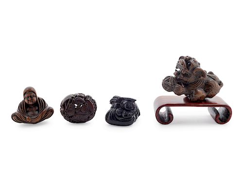 Four Japanese Carved Wood Netsuke
Largest: width 2 1/2 in., 6 cm.