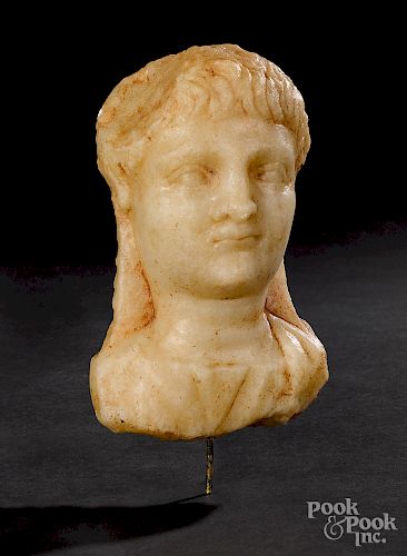 Roman alabaster relief bust of a male youth