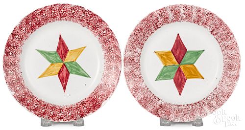 Two red spatter plates
