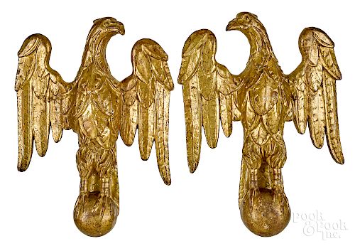 Pair of carved and gilded eagles