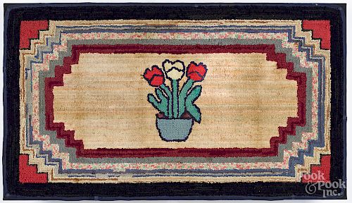Hooked rug with potted tulips, early 20th c.