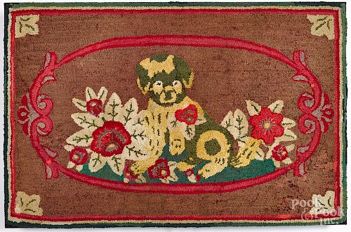 Dog and floral hooked rug, early 20th c.