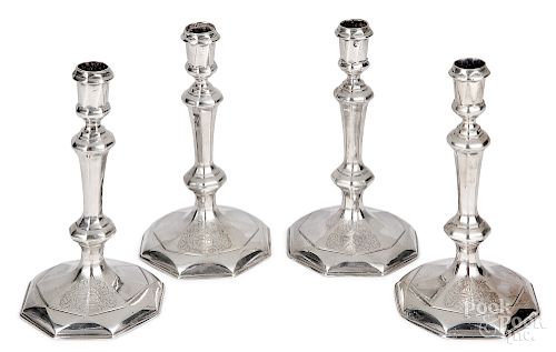 Set of four English Britannia silver candlesticks