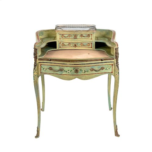 A Louis XV Style Painted Bureau de Dame
19TH CENTURY
with gilt metal mounts, marble inset top shelf with three-quarter pierced gallery.
Height 38 x wi