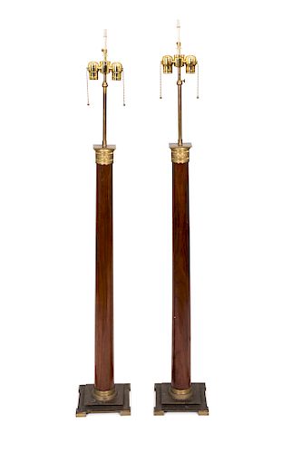 A Pair of French Empire Style Gilt Bronze Mounted Walnut Floor Lamps
Height 56 1/2 inches.