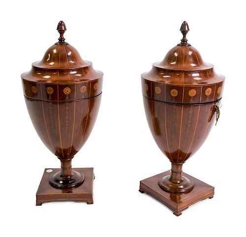 A Pair of George III Satinwood Inlaid Mahogany Urn-form Knife Boxes
Height 28 1/2 inches.