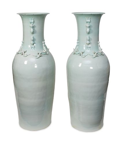 A Pair of Chinese Celadon Glazed Palace Vases
20TH CENTURY
the necks having applied salamanders.
Height 57 inches.