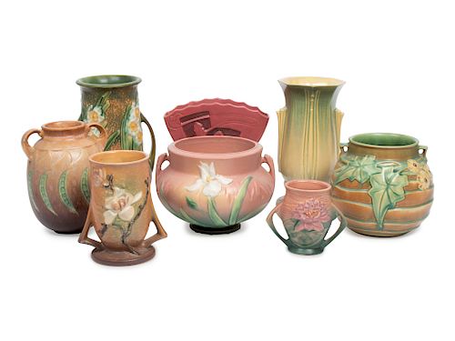 A Group of Eight Roseville Pottery Vases
Height of tallest 9 1/4 inches.