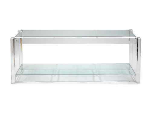 A Contemporary Lucite Console Table
20TH CENTURY 
having an inset glass top and lower shelf.
Height 26 3/4 x width 72 1/2 x depth 16 3/4 inches.