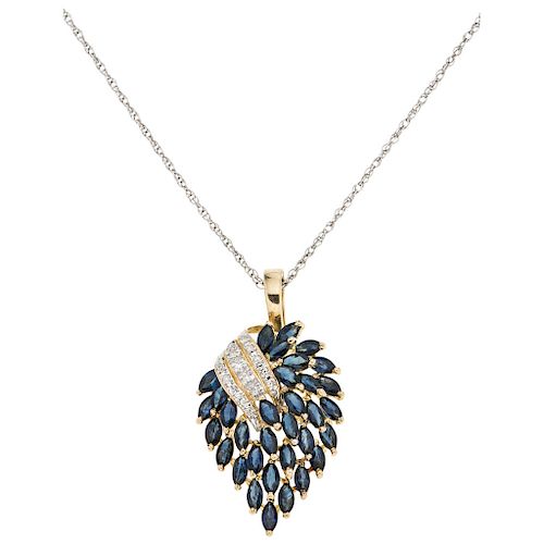 A diamond and sapphire 14K white and yellow gold necklace and pendant.