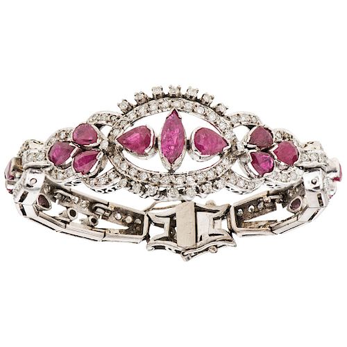 A ruby and diamond palladium silver bangle bracelet.  