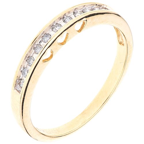 A diamond 14K yellow gold half eternity ring. 