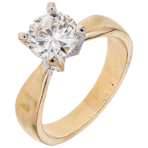 A diamond 14K yellow gold solitaire ring. 