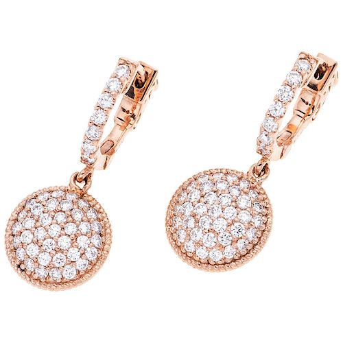 A diamond 14K pink gold pair of earrings. 