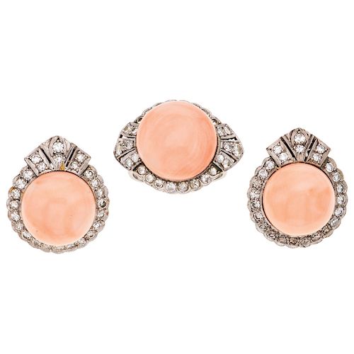 A coral and diamond palladium silver ring and pair of earrings set. 
