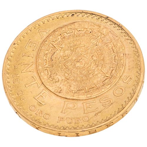A 21.6K yellow gold coin. 