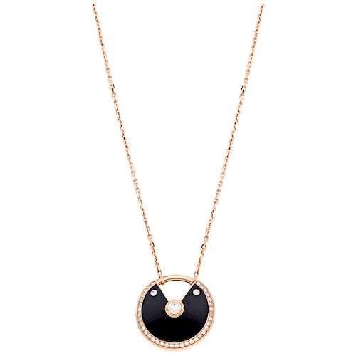 DE LA FIRMA CARTIER, AMULETTE COLECTION diamond and onix 18K pink gold necklace and pendant.  