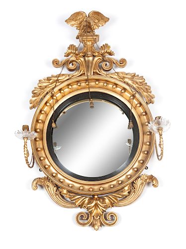 An American Federal Convex Giltwood Mirror
Height 40 x width 27 inches.